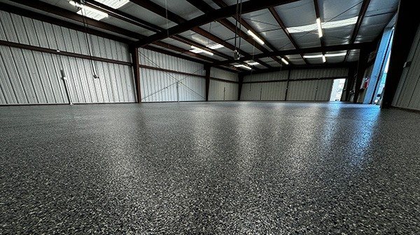 Epoxy floor in warehouse | All American Flooring